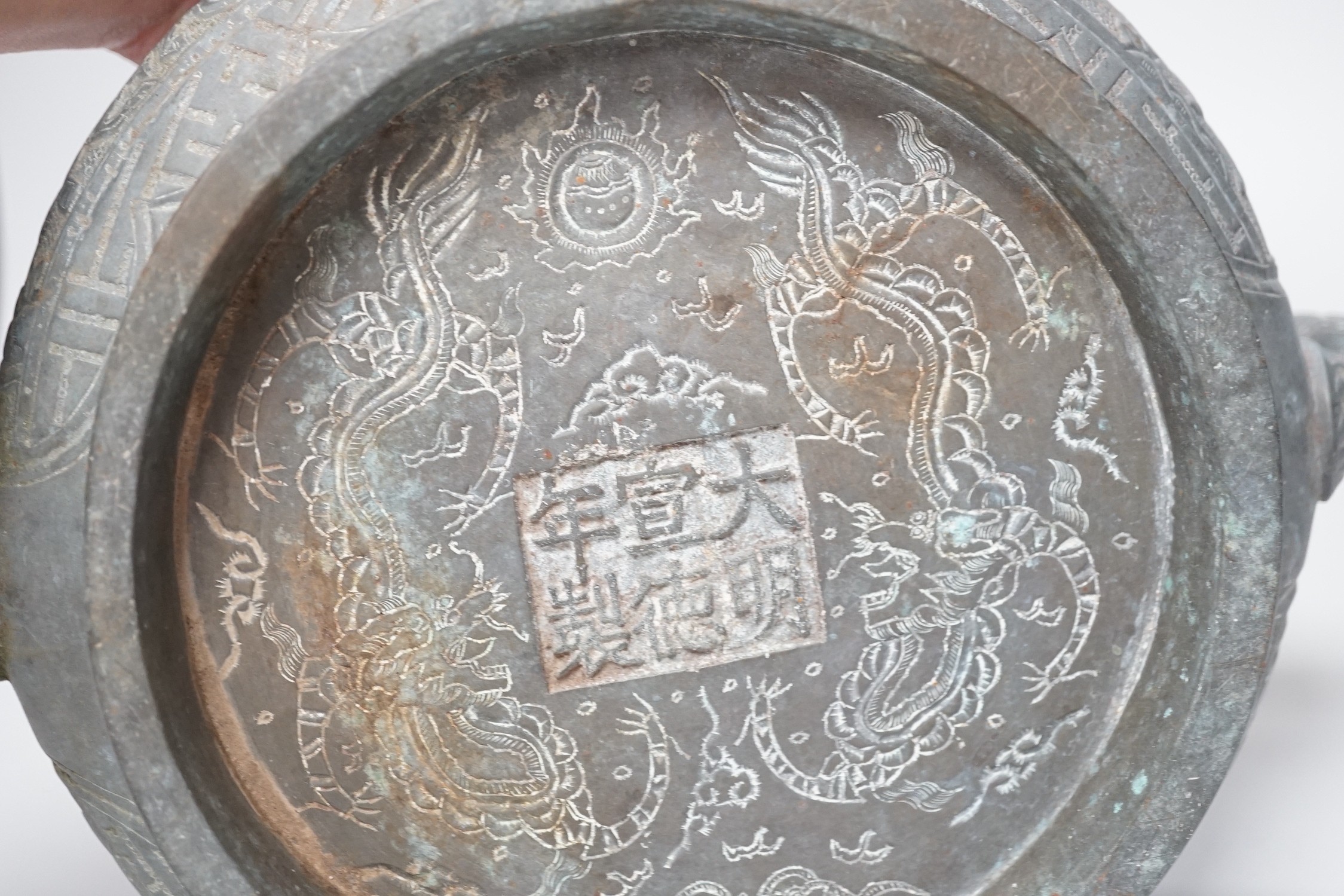 A large late 19th/early 20th century Chinese bronze censer, gui, Xuande mark, together with four Chinese figures. Tallest 12cm